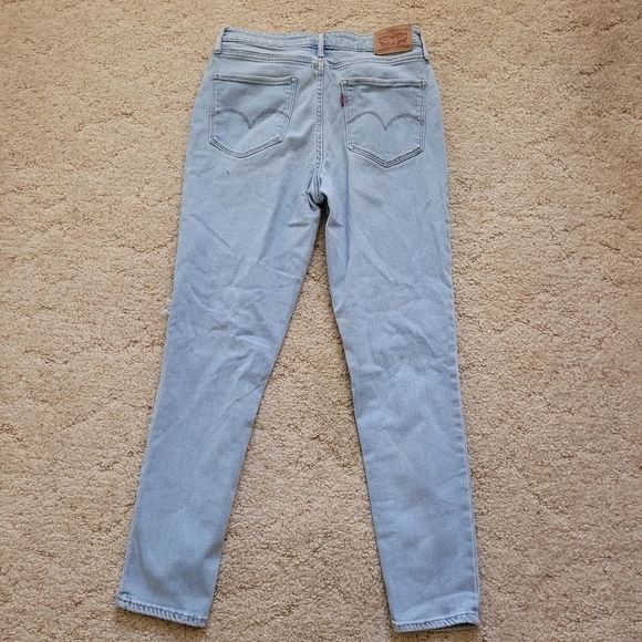 721 High Rise Skinny Light Wash Distressed Jeans - Picture 5 of 6